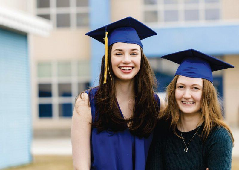 玛吉Zaverl, 左, 和简·梅纳德, graduates of Monroe Catholic High School, received academic scholarships from GVEA in 2023.